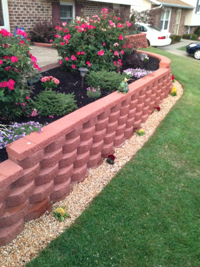 How To Prepare A Garden Bed For Decorative Landscaping Stone