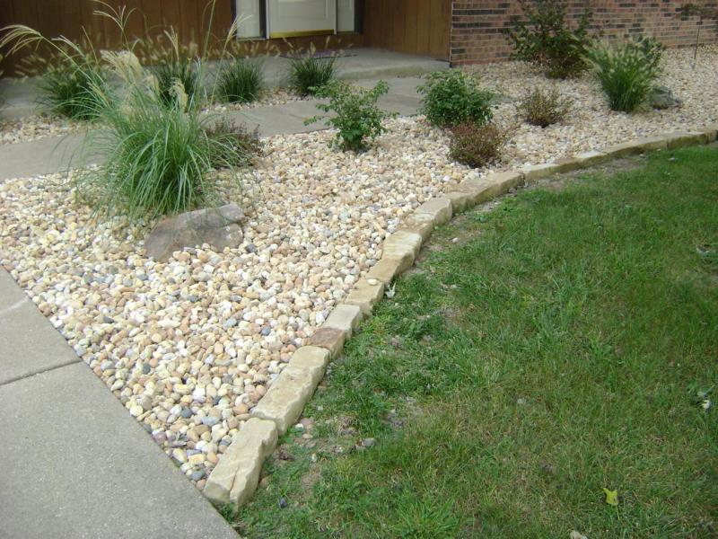 How To Prepare A Garden Bed For Decorative Landscaping Stone